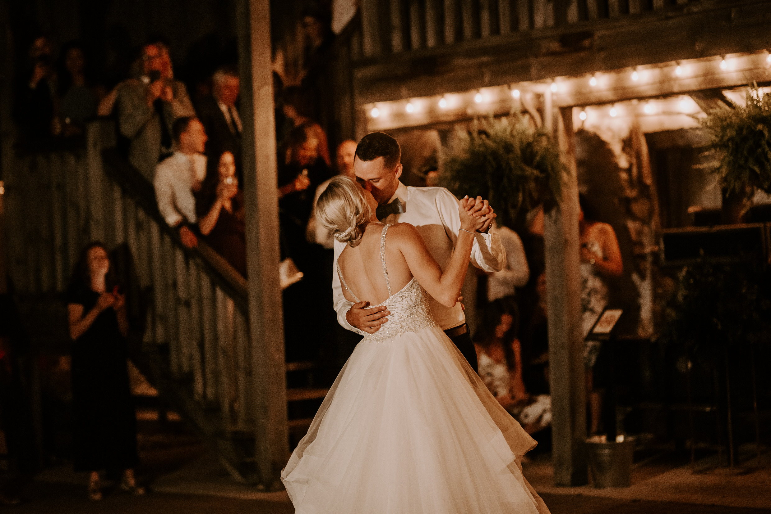 Belcroft Estates Wedding - bride and groom kiss and dance