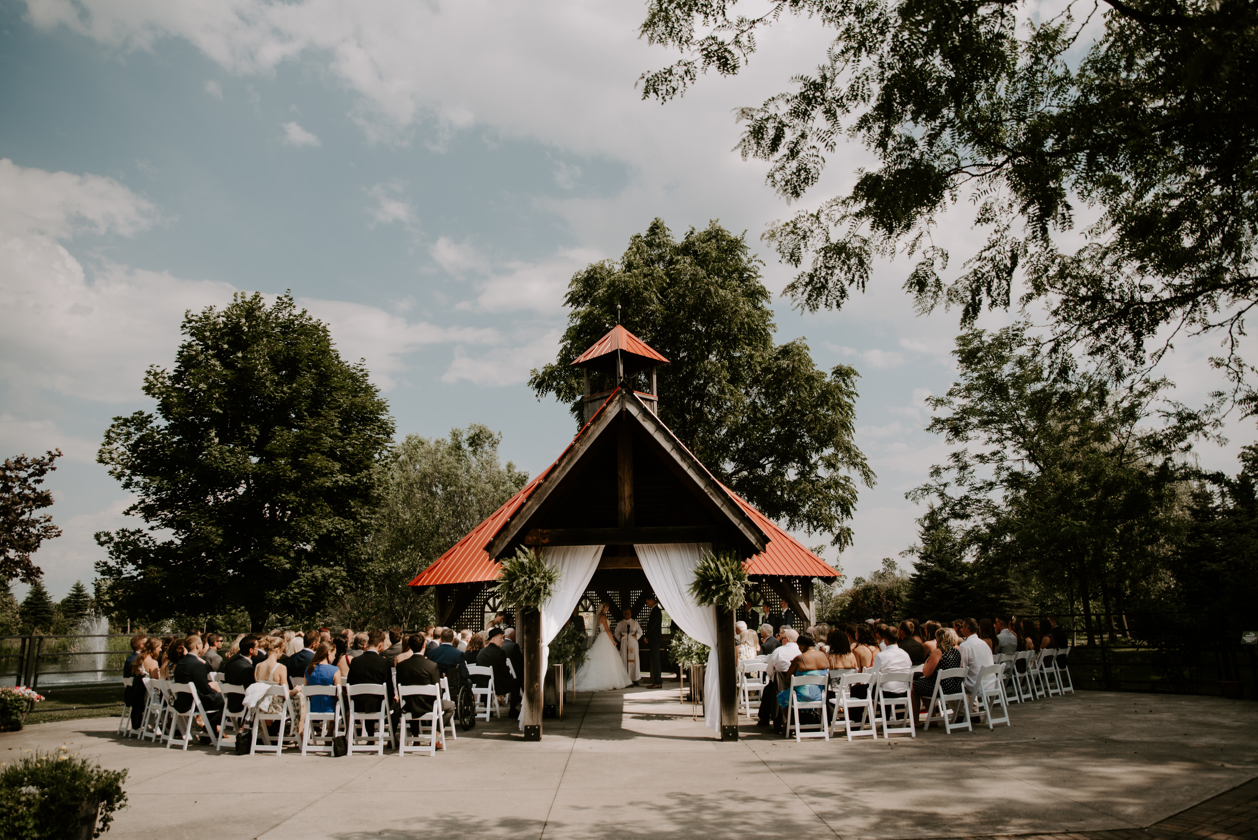 Belcroft Estates Wedding - wedding ceremony under gazebo