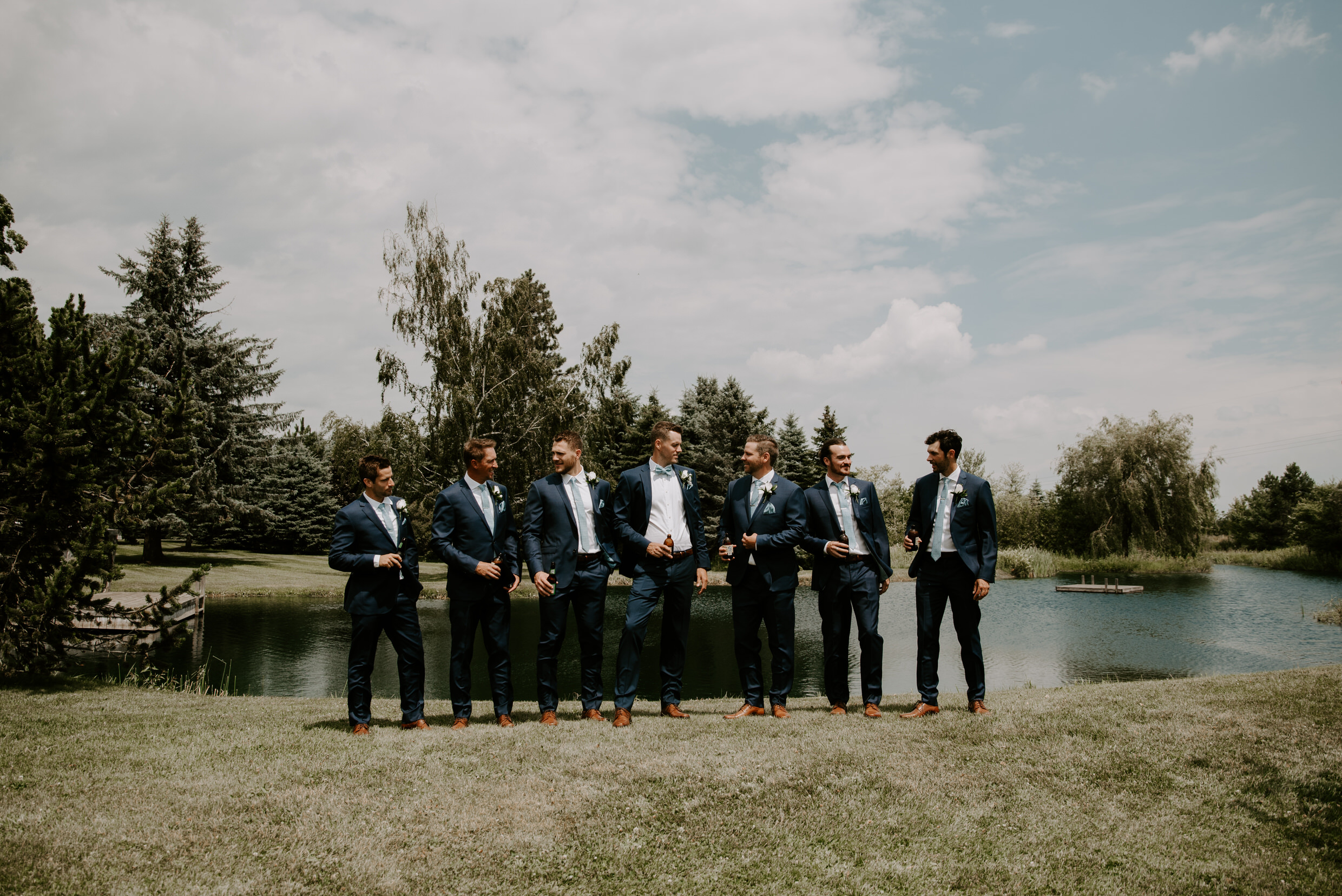 Belcroft Estates Wedding- groomsmen by the pond