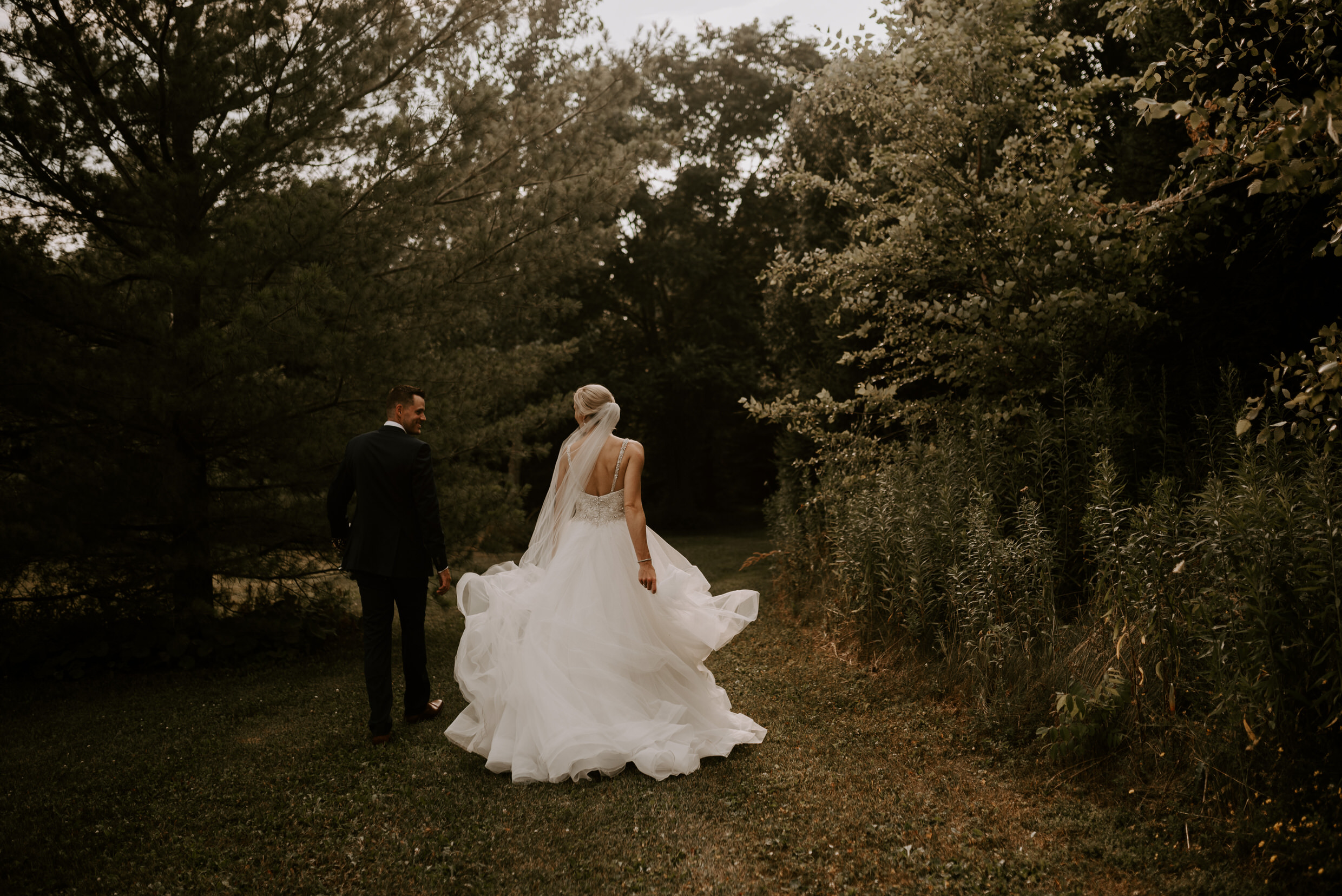 Belcroft Estates Wedding - walking through the forest