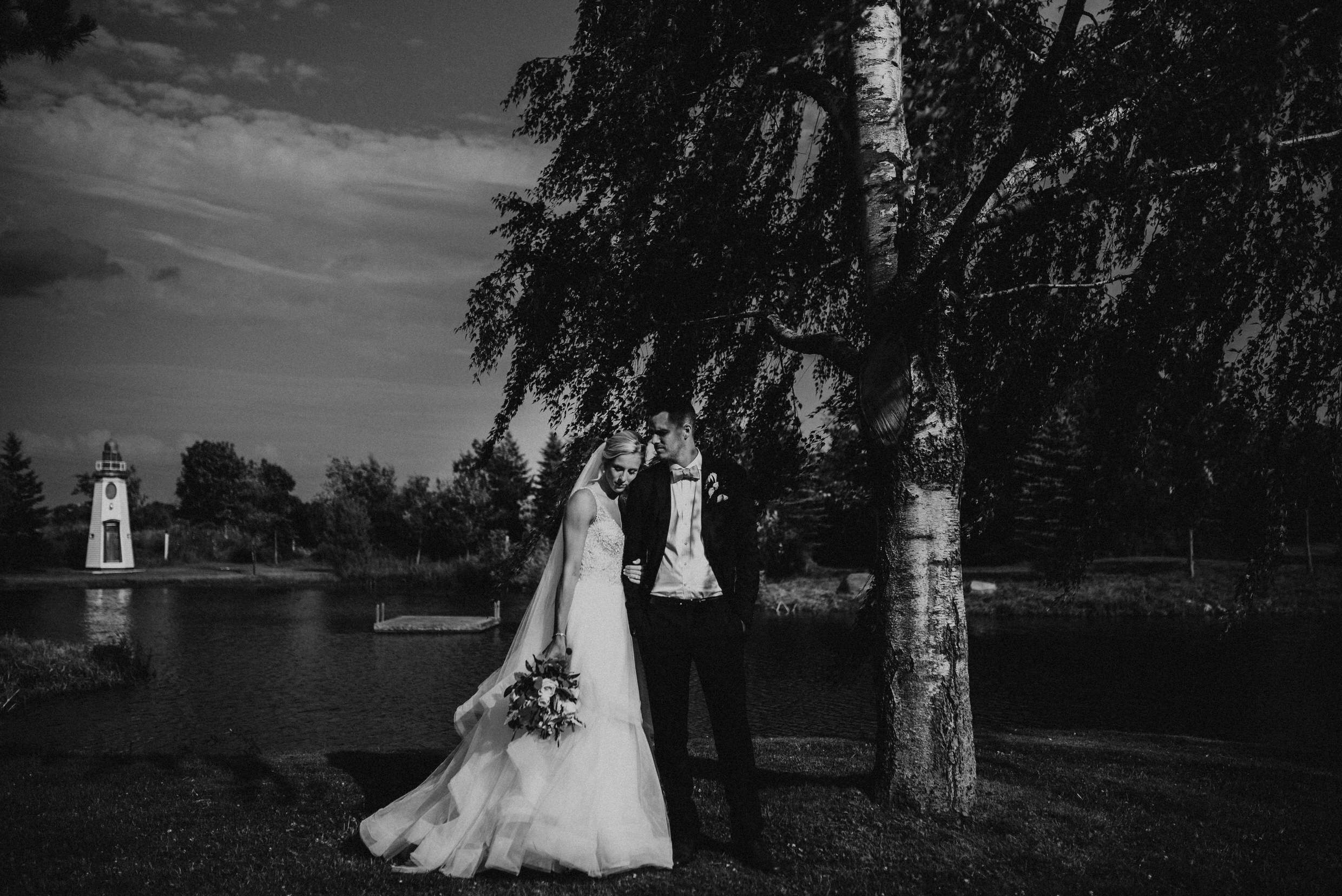 Belcroft Estates Wedding - bride and groom by the pond