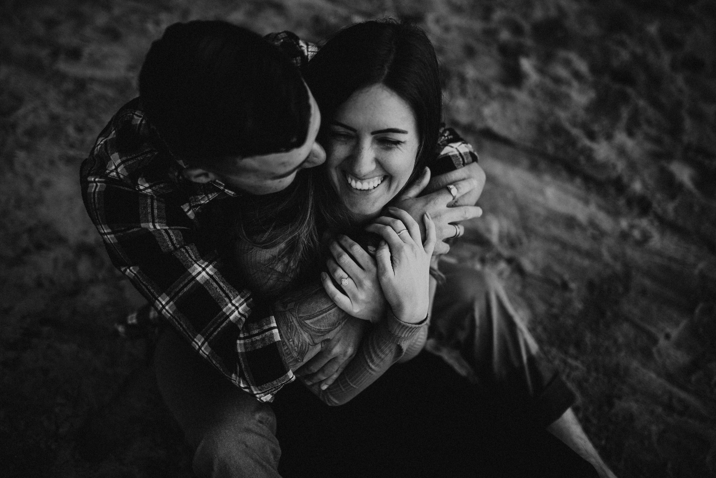 Muskoka Engagement Session - playful kisses on the beach