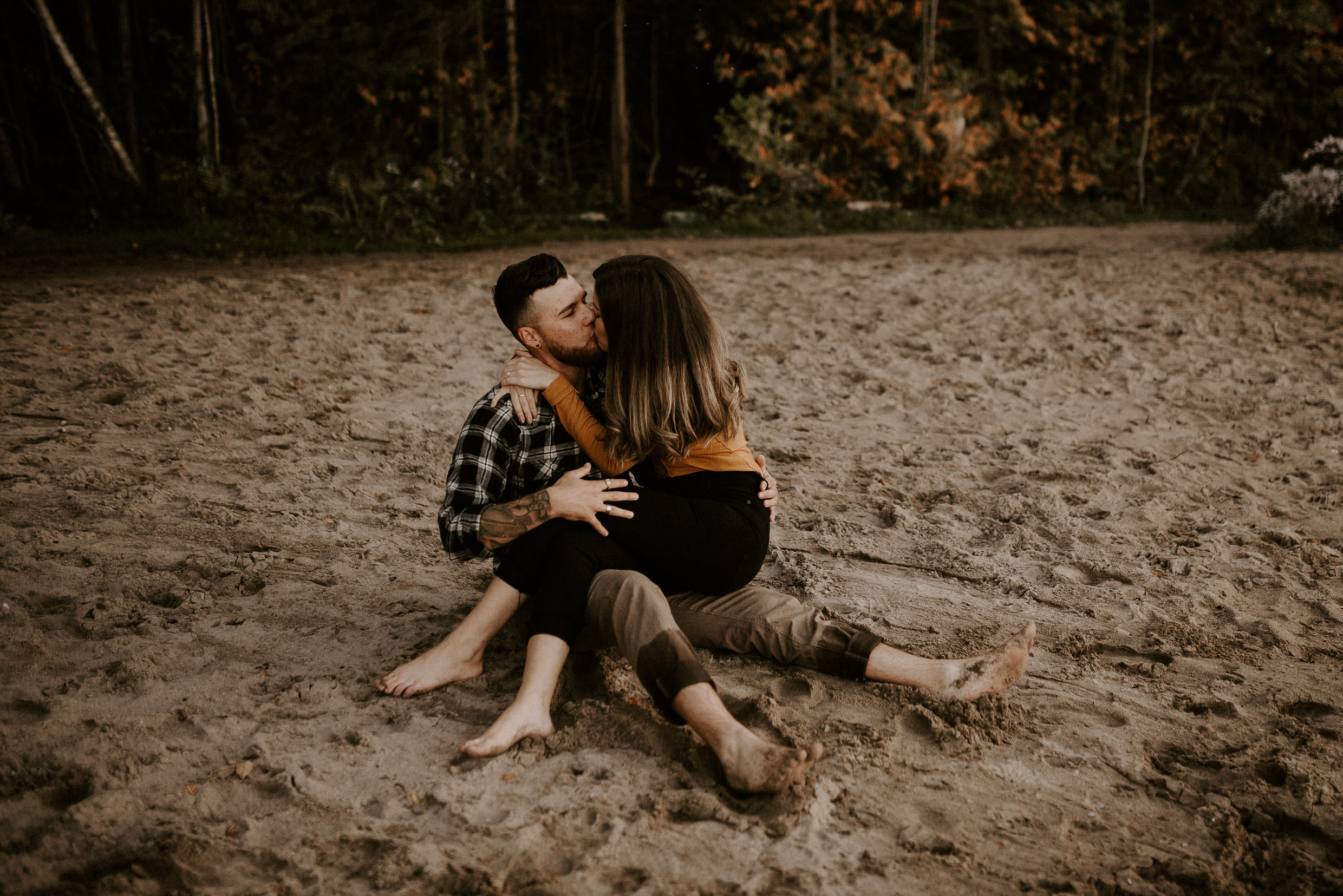 Muskoka Engagement Session - kissing in the sand