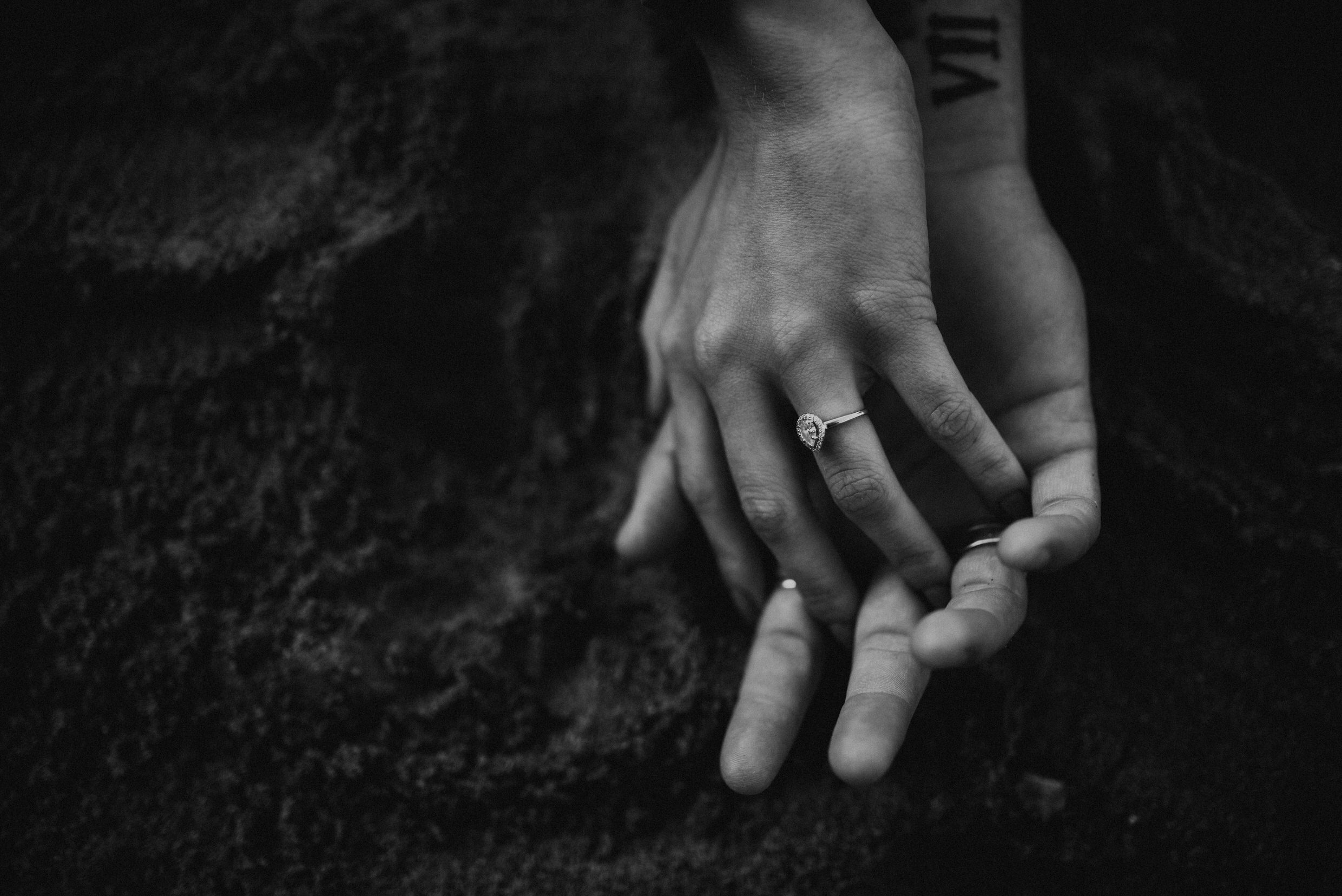 Muskoka Engagement Session - engagement ring hands in the sand
