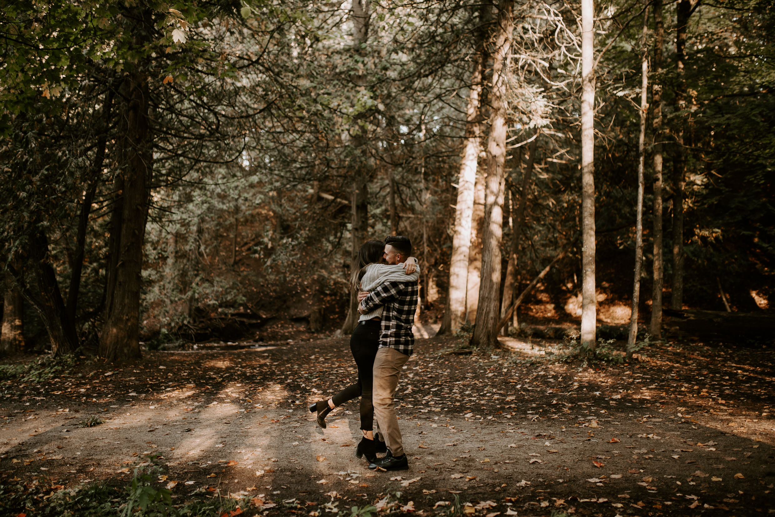 Muskoka Engagement Session - kissing in the forest